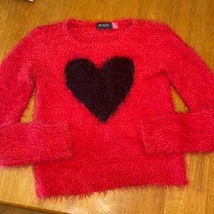 Red sweater with heart